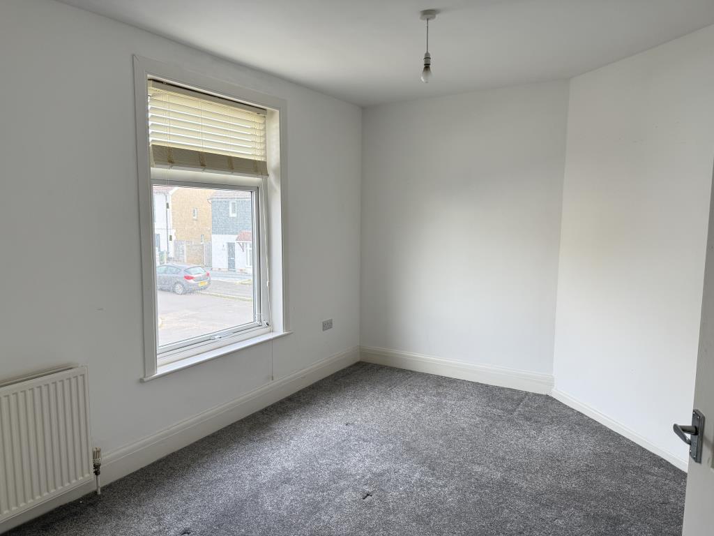 Lot: 24 - TWO-BEDROOM SEMI-DETACHED HOUSE - Bedroom one with white walls and grey carpet